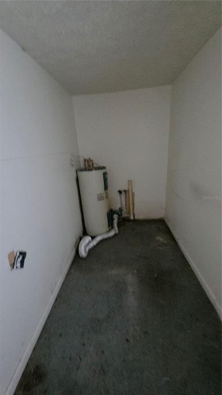 216 Northwest 4th Avenue Mulberry, FL 33860 - Photo 25 of 45 a view of room with racks on the wall