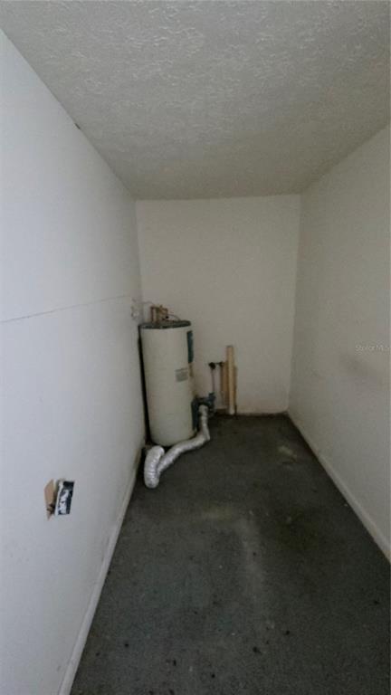 216 Northwest 4th Avenue Mulberry, FL 33860 - Photo 28 of 45 a view of a room with rack and a chair