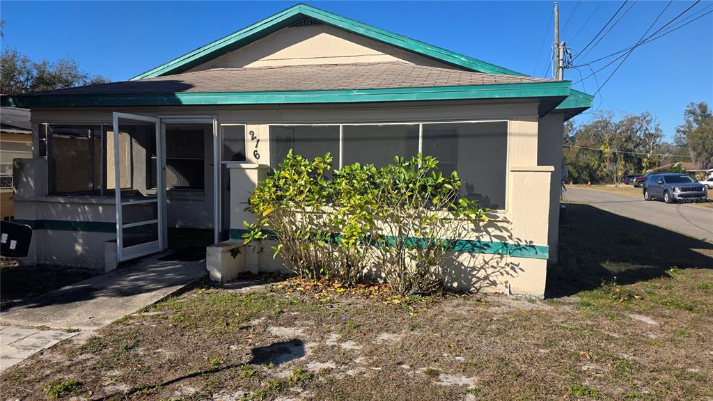 216 Northwest 4th Avenue Mulberry, FL 33860 - Photo 31 of 45 a front view of a house with garden