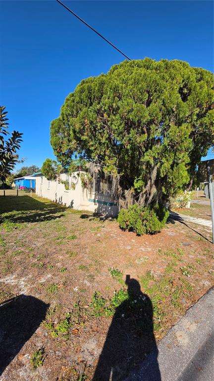 216 Northwest 4th Avenue Mulberry, FL 33860 - Photo 44 of 45 a view of a large body of water with a building in the background
