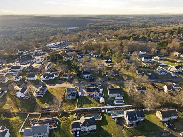 a bedroom with a bed and dresser
