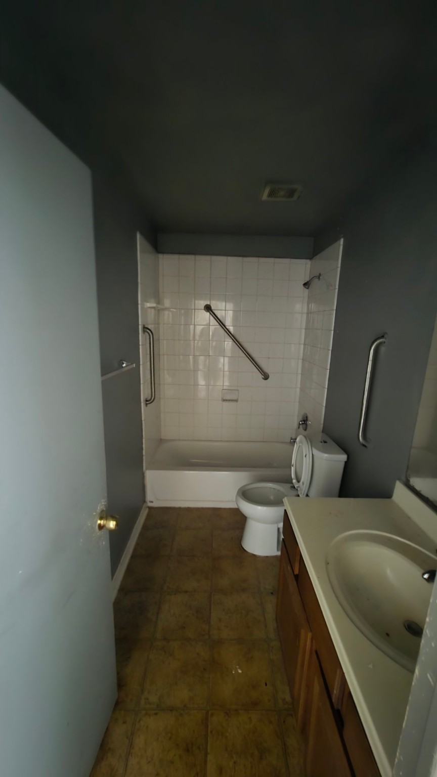 6114 Haight Street Houston, TX 77028 - Photo 11 of 11 a bathroom with a sink and toilet