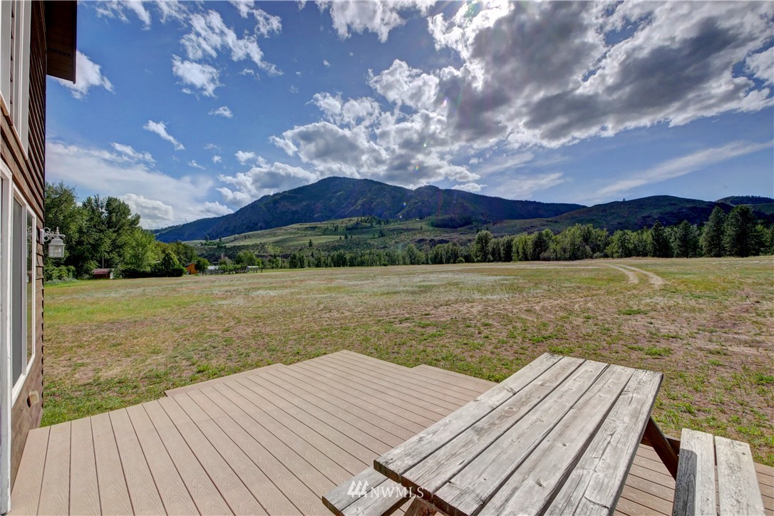 36 Beaver Pond Road Twisp, WA 98856 - Photo 1 of 40 a view of a house with a yard