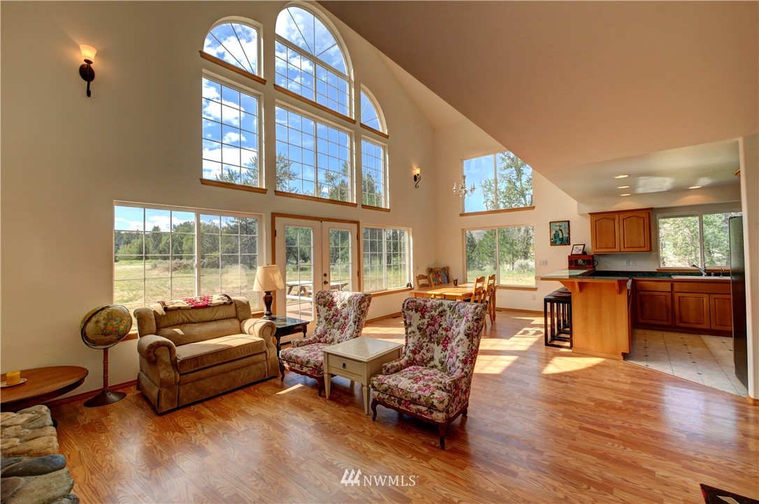 36 Beaver Pond Road Twisp, WA 98856 - Photo 13 of 40 a living room with furniture and a large window