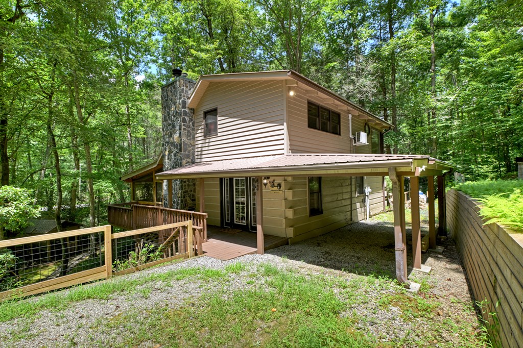 100 Stanley Creek Road Cherry Log, GA 30522 - Photo 26 of 81 a view of a house with backyard porch and sitting area