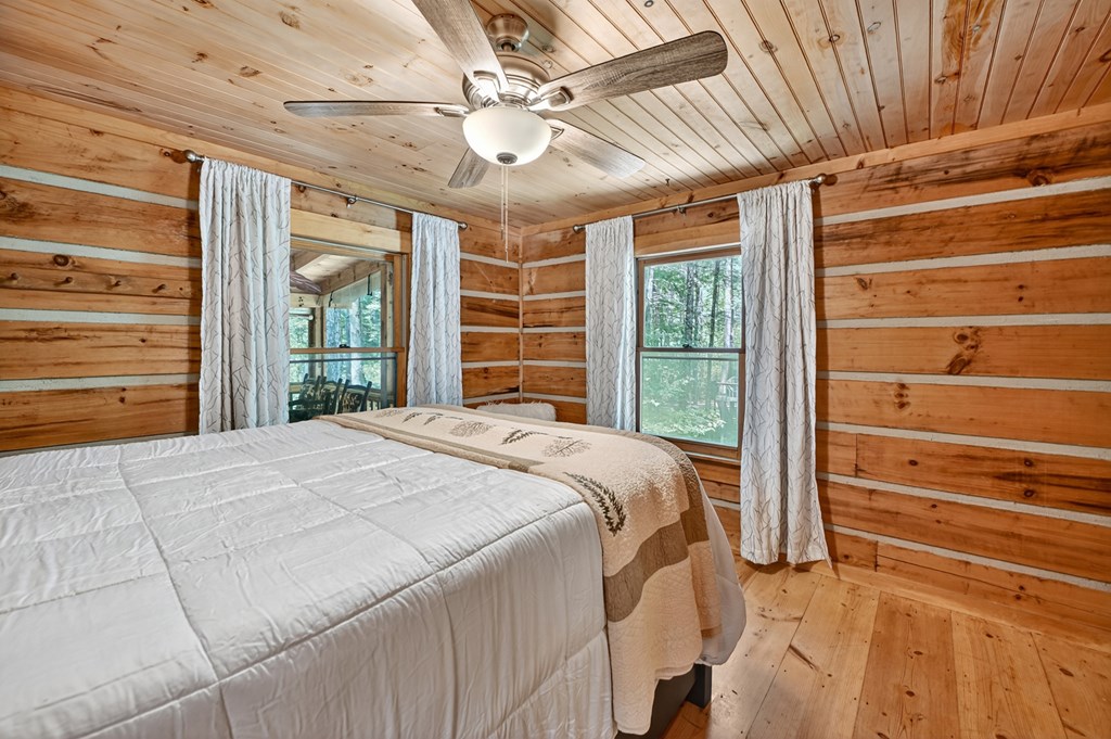 100 Stanley Creek Road Cherry Log, GA 30522 - Photo 50 of 81 a bedroom with a bed and a window