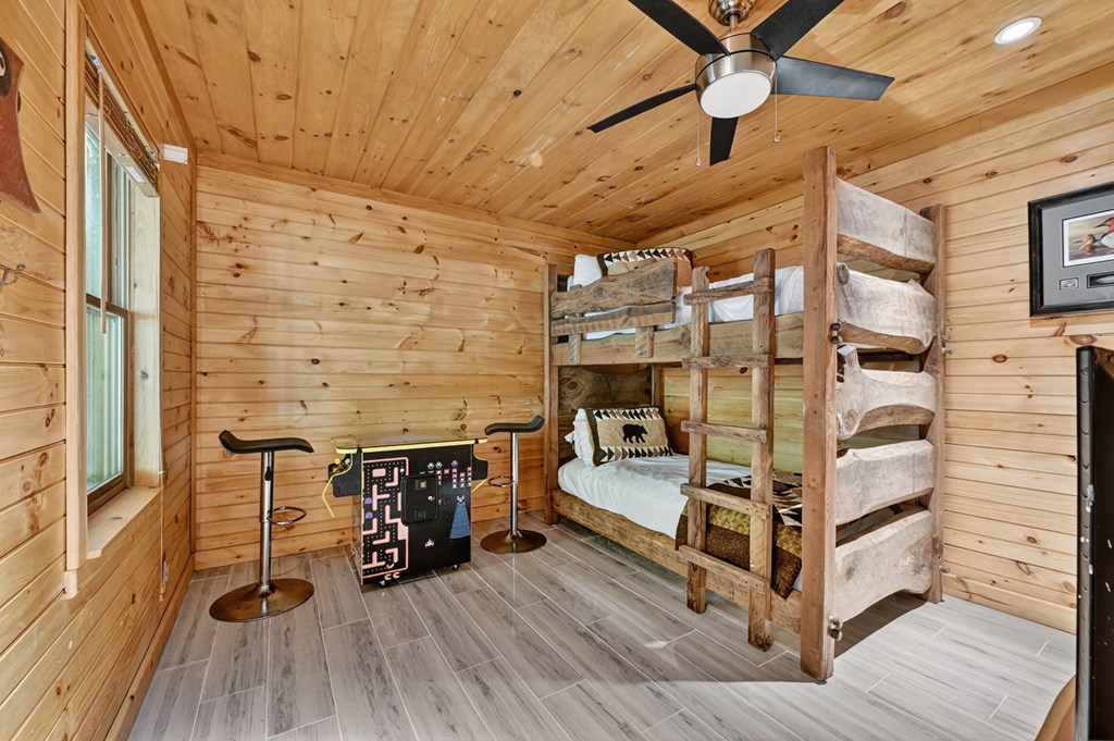 100 Stanley Creek Road Cherry Log, GA 30522 - Photo 78 of 81 a view of a balcony with chair and wooden floor