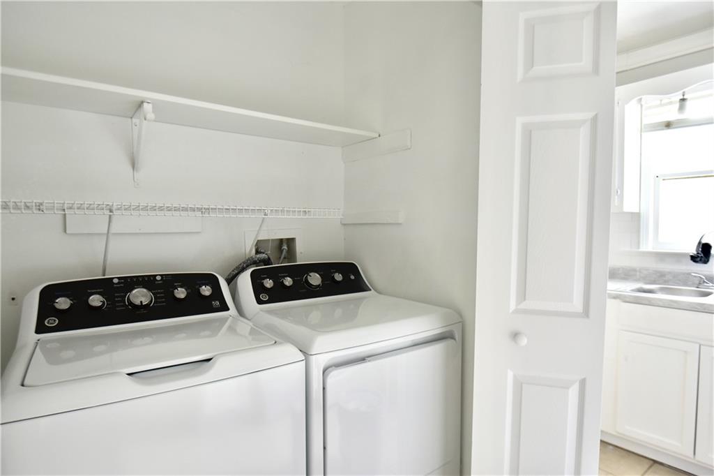 2898 Webb Bridge Road Alpharetta, GA 30009 - Photo 4 of 8 a room with storage and utility