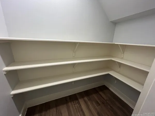 a storage room with washer and dryer