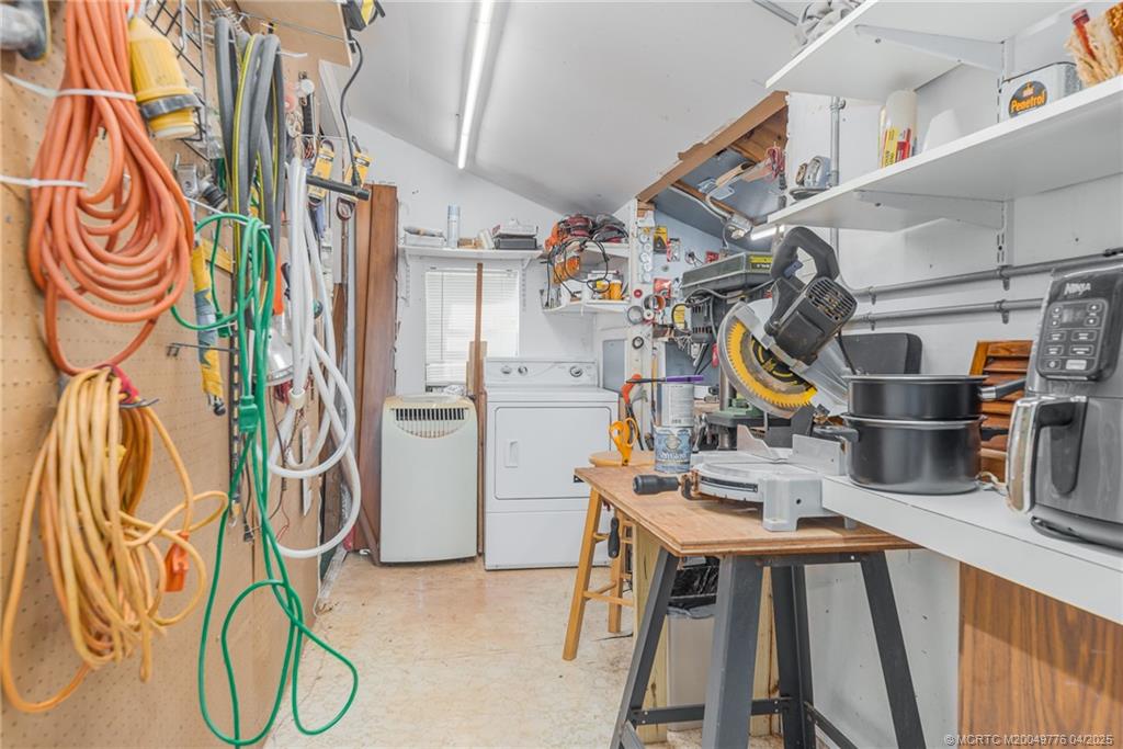 3901 Southeast St Lucie Boulevard, Unit 34 Stuart, FL 34997 - Photo 17 of 58 a view of storage and utility room with chairs