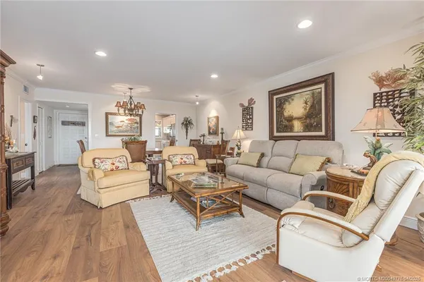 a living room with furniture and a couch