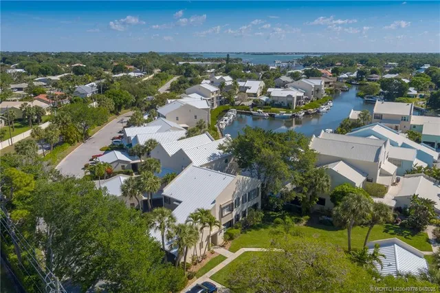 an aerial view of a house with a garden