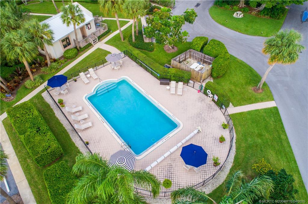 3901 Southeast St Lucie Boulevard, Unit 34 Stuart, FL 34997 - Photo 57 of 58 an aerial view of a house