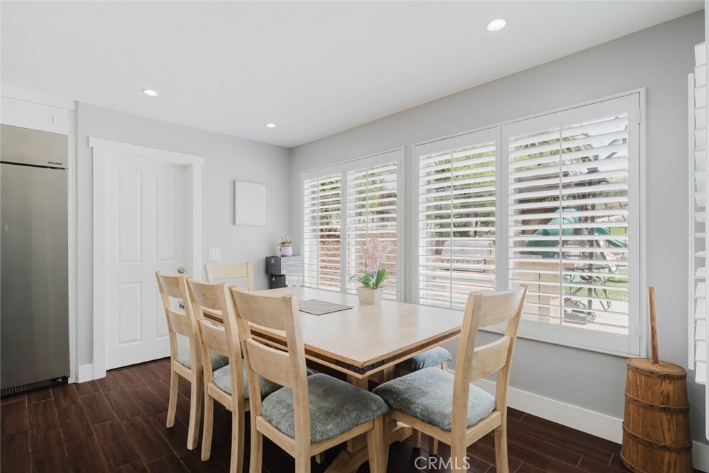 32480 The Old Road Castaic, CA 91384 - Photo 26 of 68 a view of a dining room with furniture and wooden floor