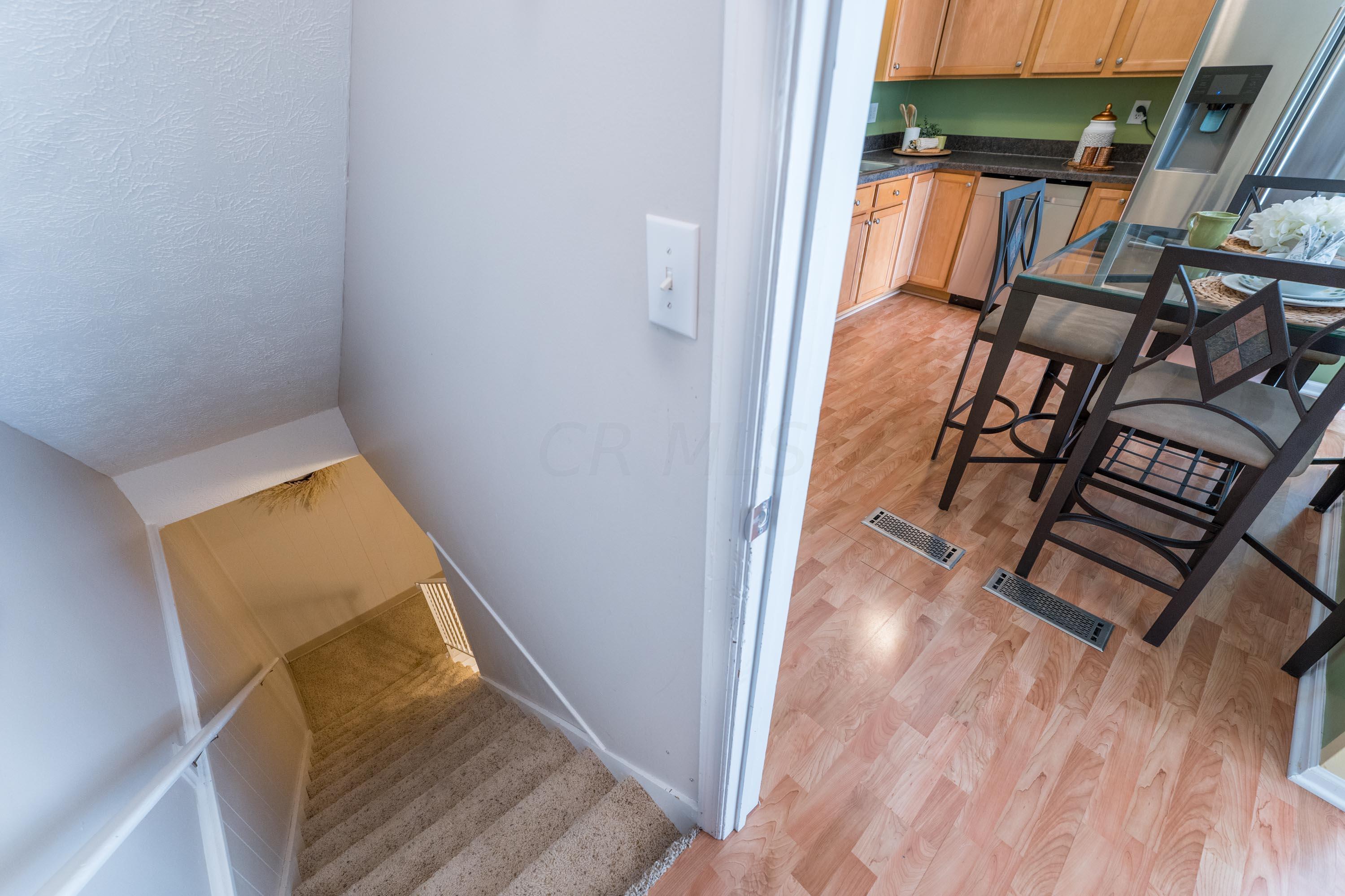7762 Sawmill Road Dublin, OH 43016 - Photo 28 of 38 Kitchen to finished lower level rec room