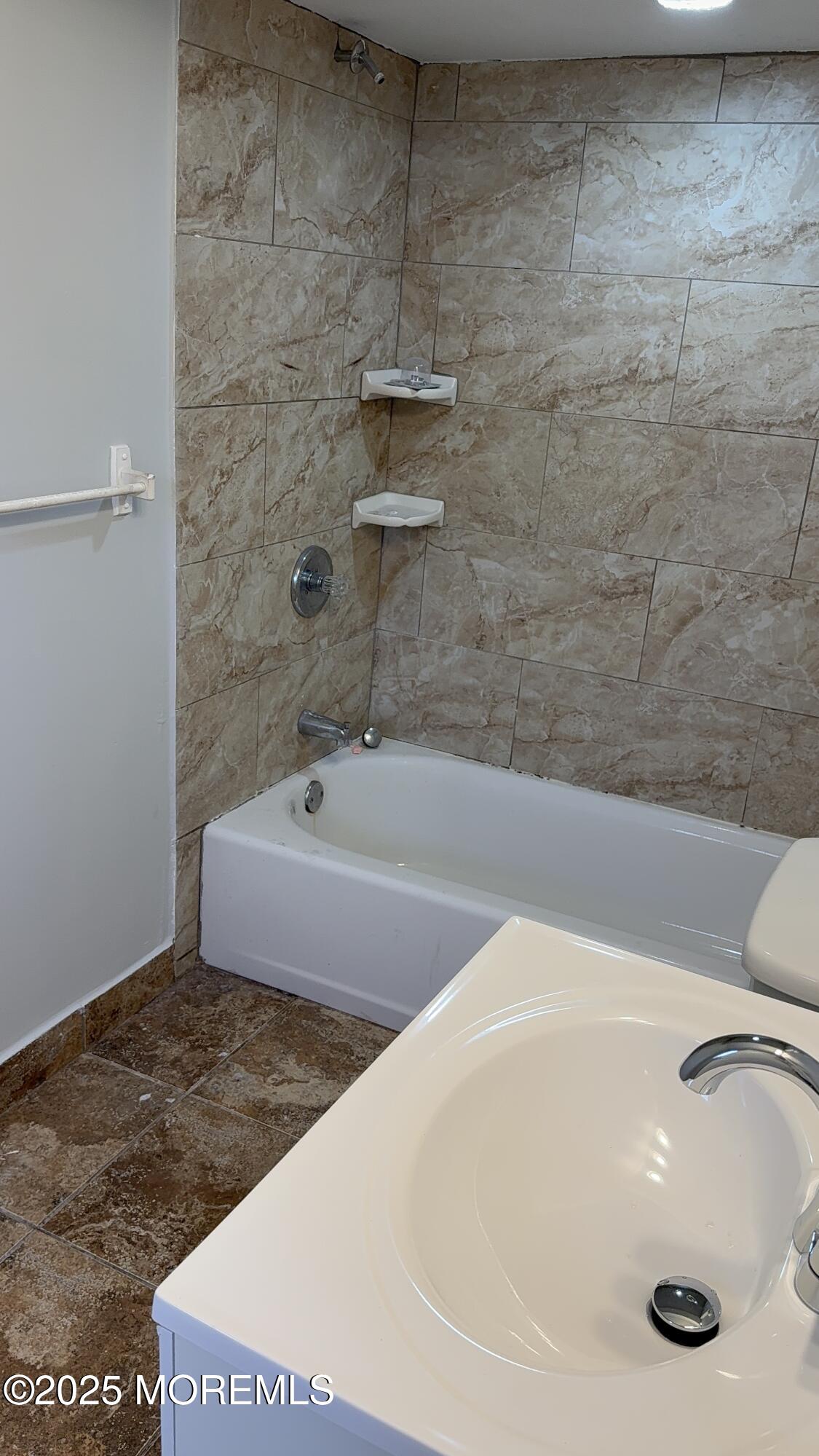 79 Pine View Avenue Keansburg, NJ 07734 - Photo 16 of 20 a bathroom with a tub