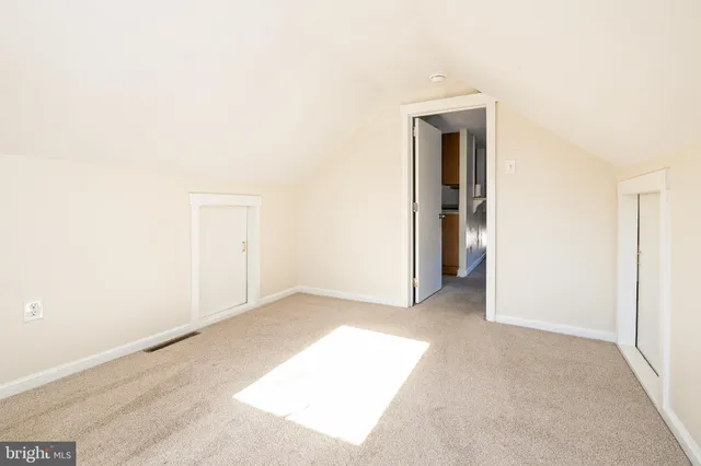 an empty room with closet