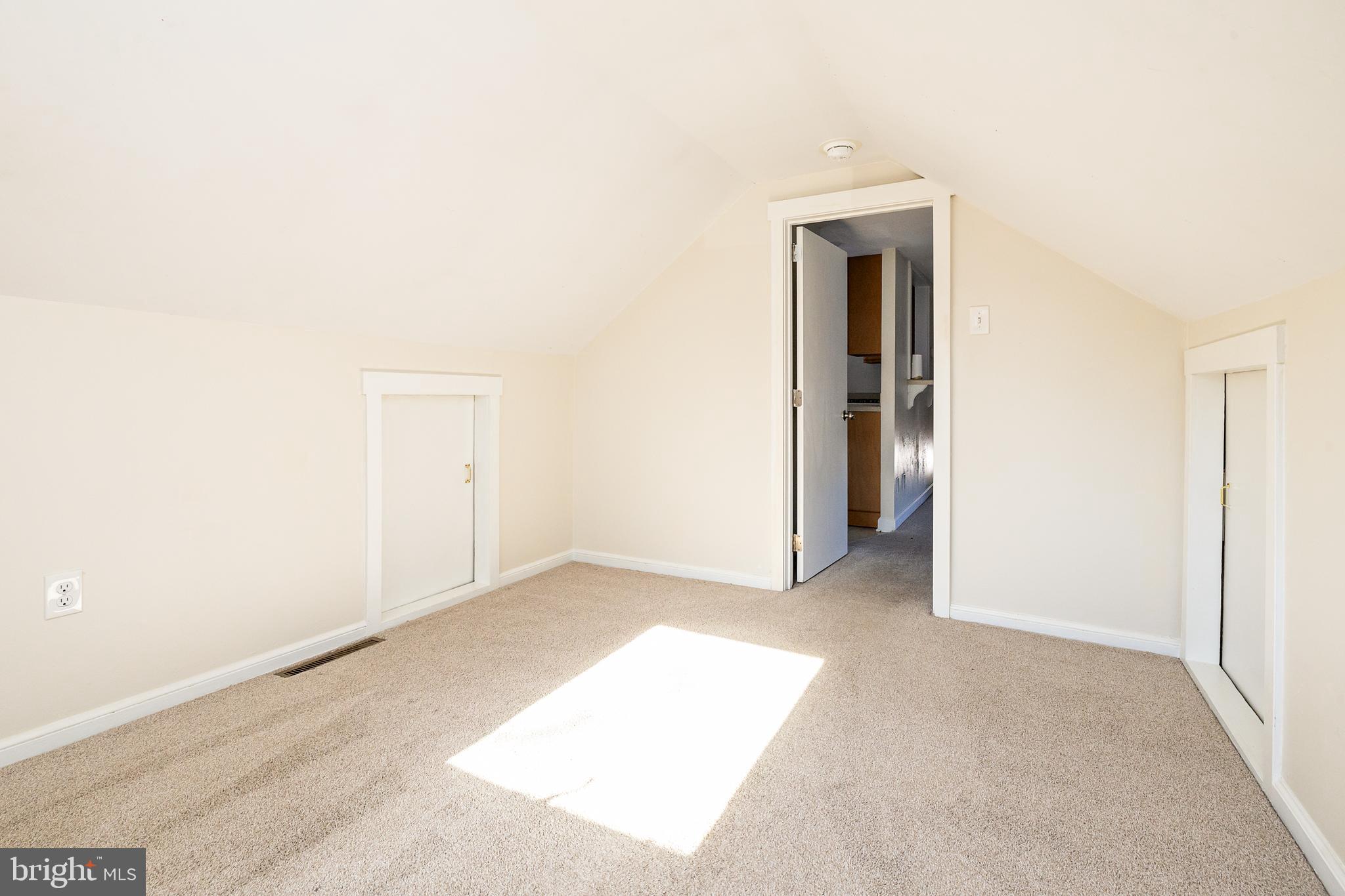 1305 Sylvan Drive Haddon Heights, NJ 08035 - Photo 13 of 25 a view of an empty room with closet and a window