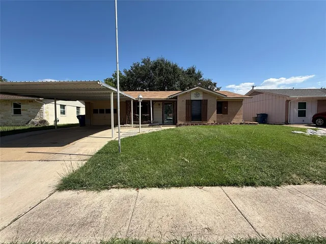 a view of a house with a patio