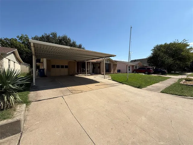 a view of a house with a patio
