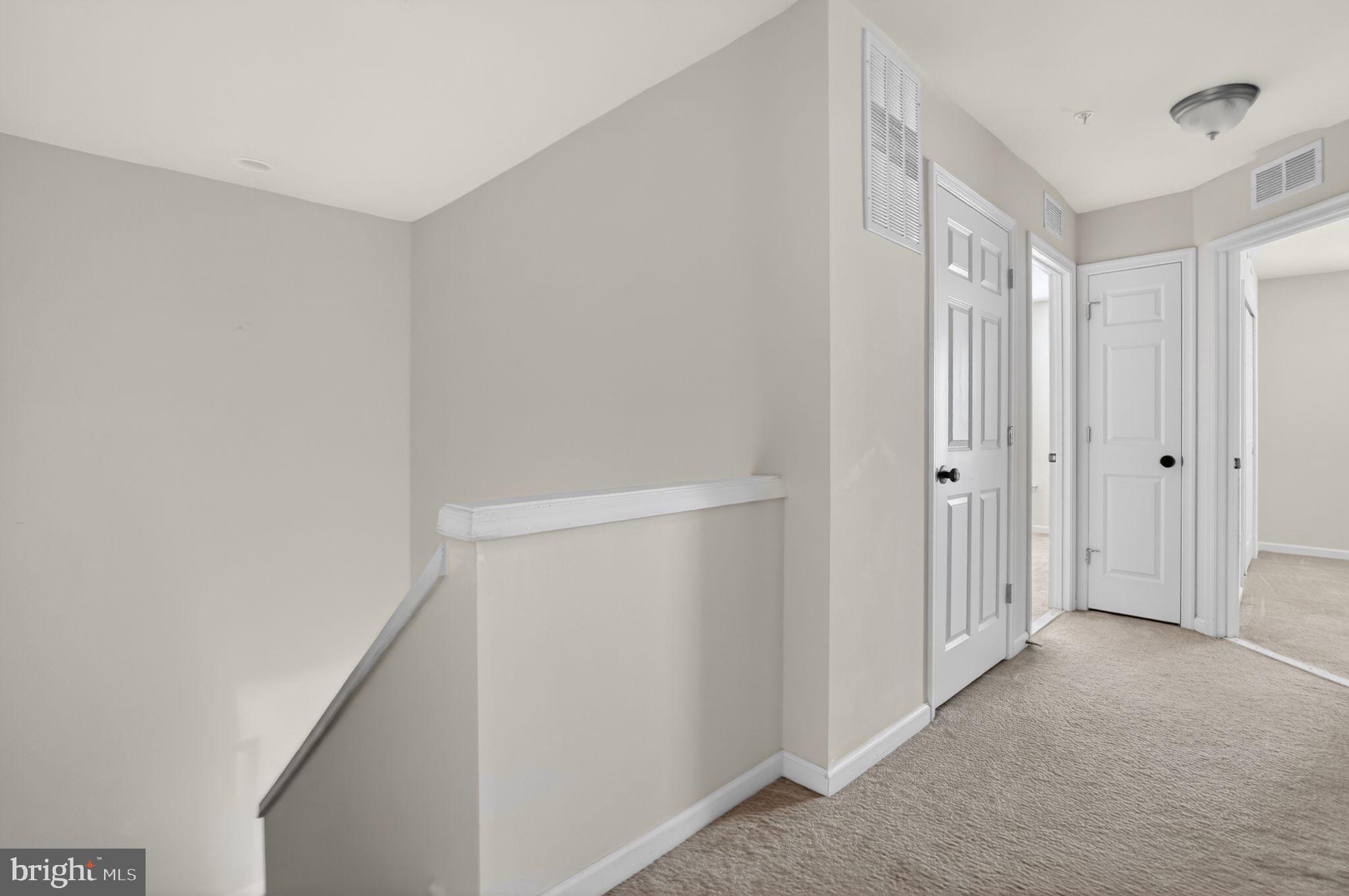 158 Intrepid Lane, Unit 92 Berlin, MD 21811 - Photo 18 of 37 a view of a hallway