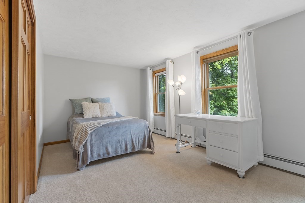 64 Wilder Road Ashby, MA 01431 - Photo 11 of 42 a bedroom with a bed and a window