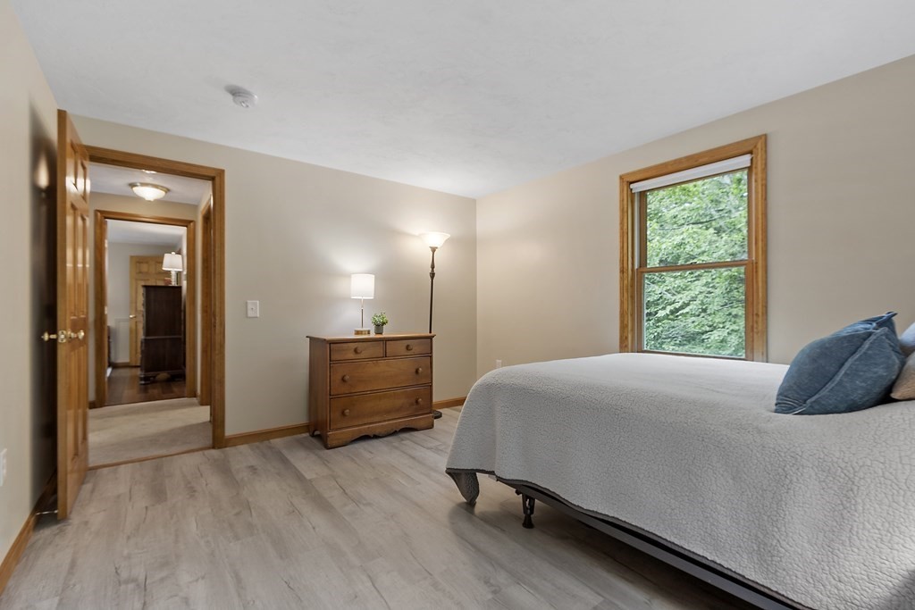 64 Wilder Road Ashby, MA 01431 - Photo 16 of 42 a bedroom with a bed and a window