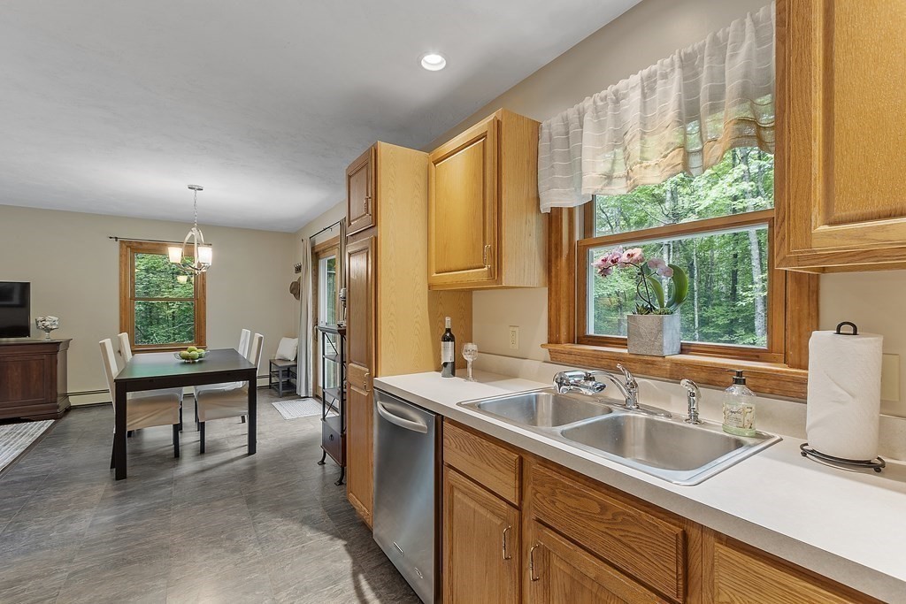 64 Wilder Road Ashby, MA 01431 - Photo 26 of 42 a kitchen that has a sink and chairs