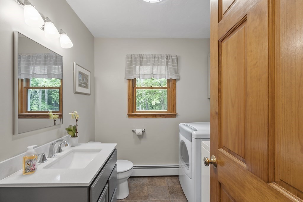 64 Wilder Road Ashby, MA 01431 - Photo 28 of 42 a bathroom with a sink a toilet and tub