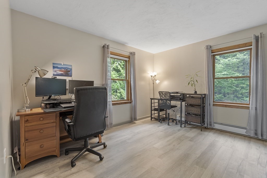 64 Wilder Road Ashby, MA 01431 - Photo 30 of 42 a view of a workspace with furniture and a window