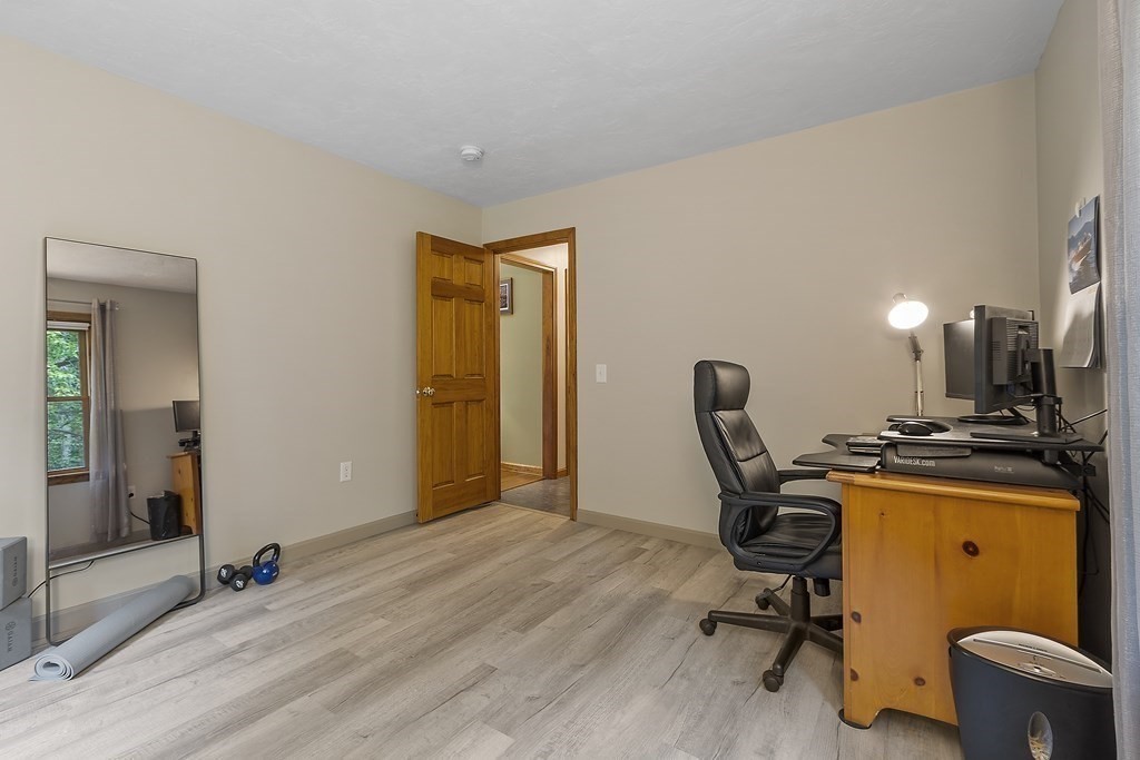 64 Wilder Road Ashby, MA 01431 - Photo 31 of 42 a view of a workspace with furniture and a window