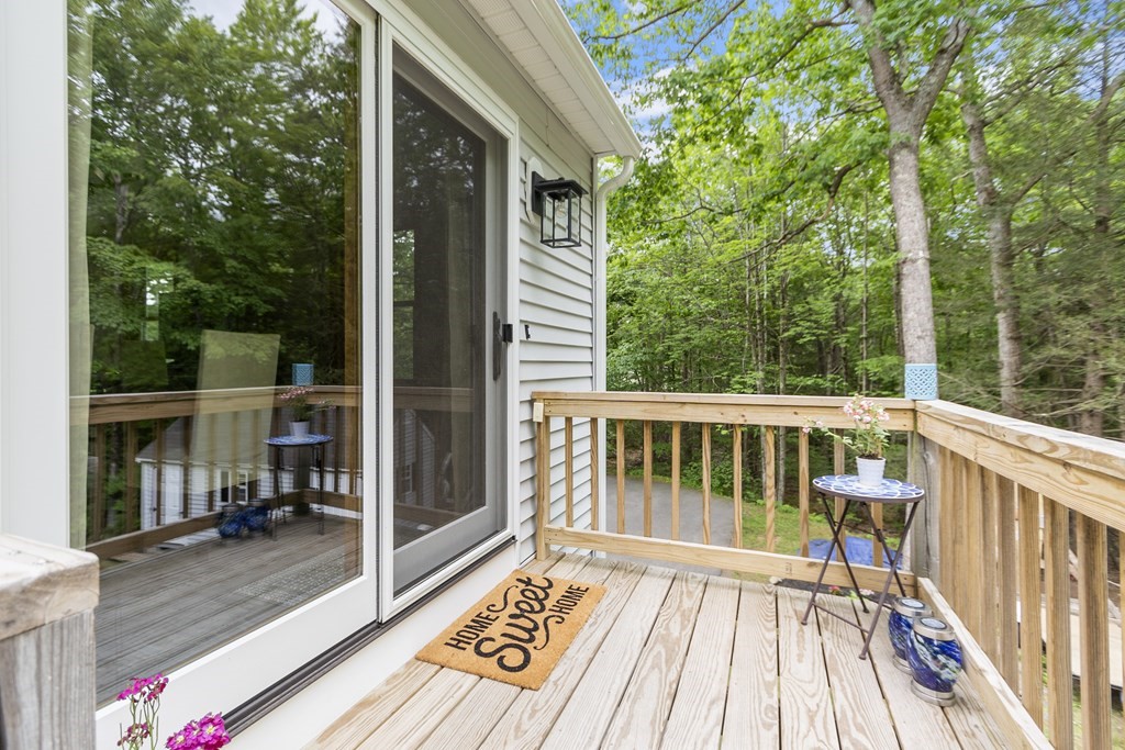 64 Wilder Road Ashby, MA 01431 - Photo 6 of 42 a view of balcony with wooden floor and fence