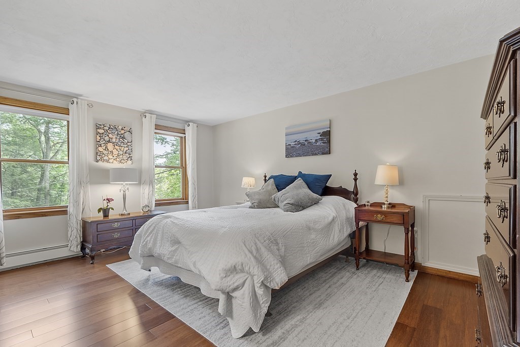 64 Wilder Road Ashby, MA 01431 - Photo 7 of 42 a bedroom with a bed and a large window