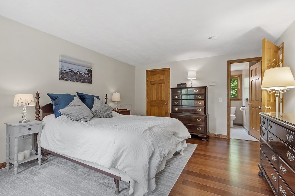 64 Wilder Road Ashby, MA 01431 - Photo 8 of 42 a bedroom with bed and wooden floor