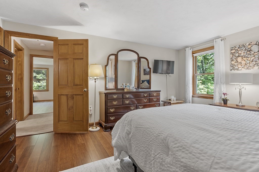 64 Wilder Road Ashby, MA 01431 - Photo 9 of 42 a bedroom with a bed and a large window