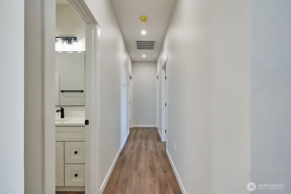 a bathroom with a sink a toilet and a bathtub
