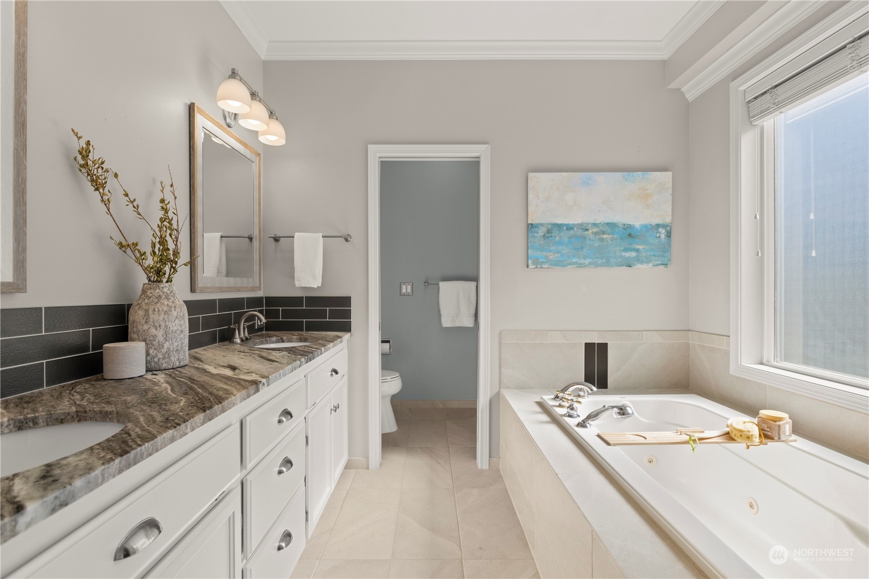1460 Latham Court DuPont, WA 98327 - Photo 12 of 40 a bathroom with a granite countertop sink and a mirror