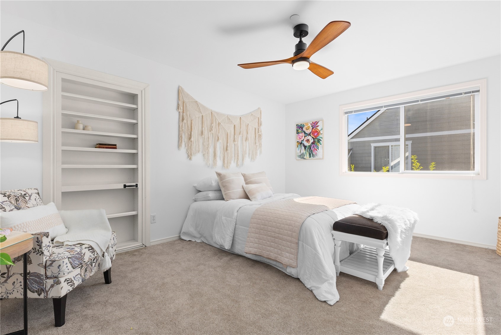 1460 Latham Court DuPont, WA 98327 - Photo 22 of 40 a bedroom with a bed and a chandelier