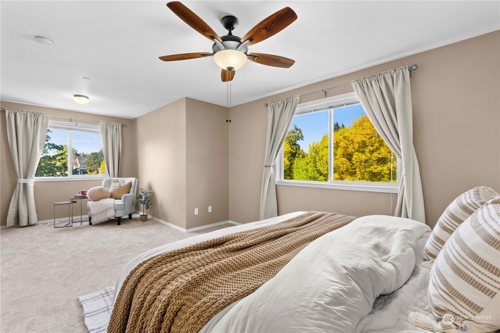 1460 Latham Court DuPont, WA 98327 - Photo 26 of 40 a bedroom with a bed and a large window