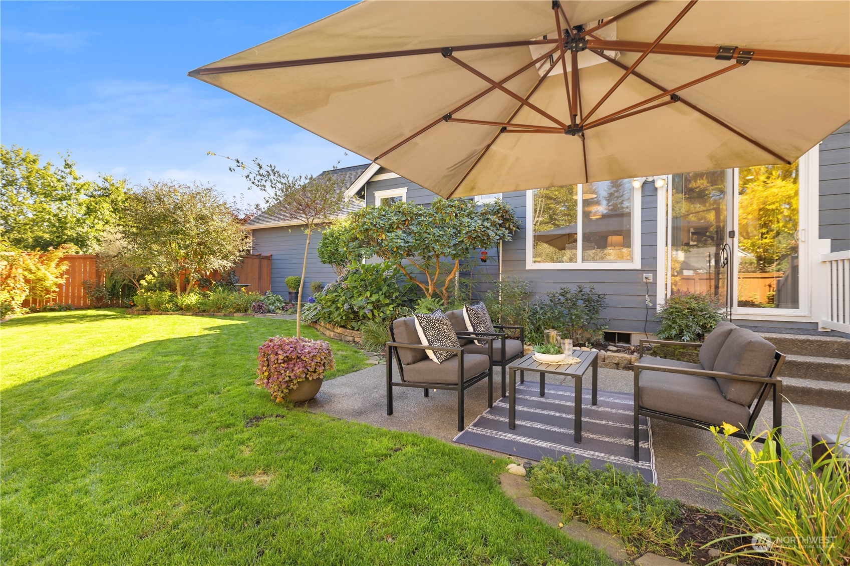 1460 Latham Court DuPont, WA 98327 - Photo 33 of 40 a backyard of a house with outdoor seating