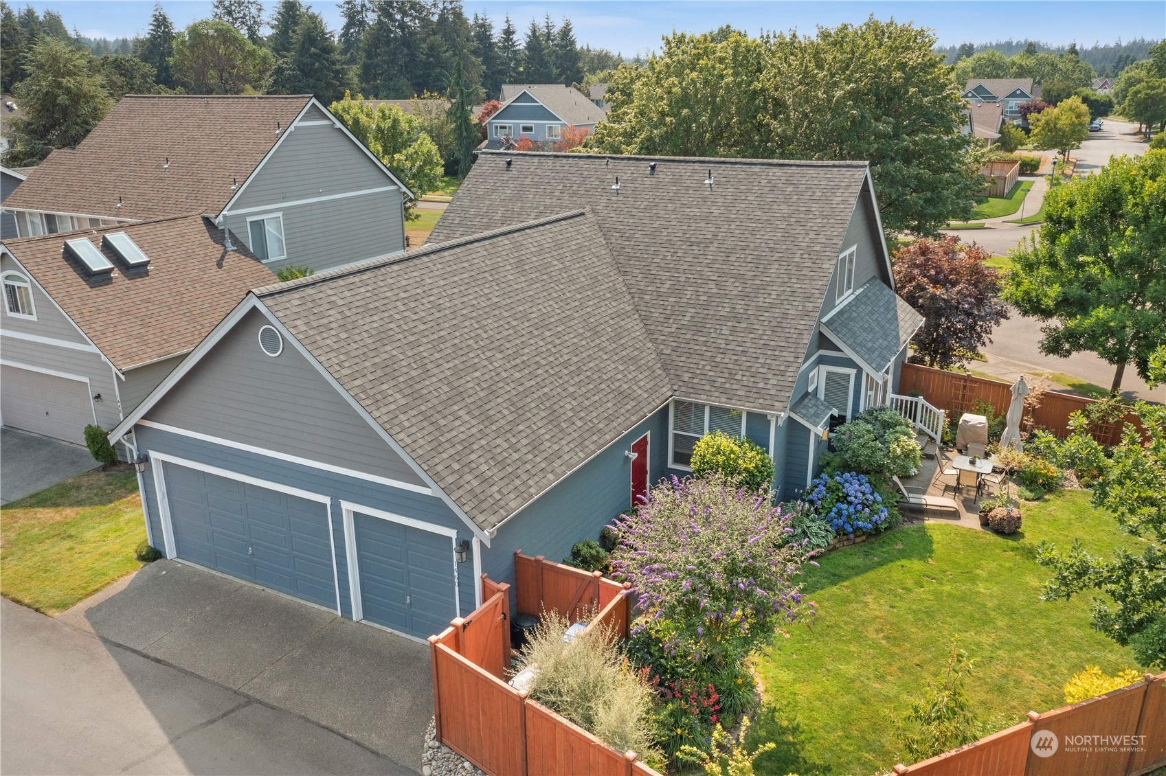 1460 Latham Court DuPont, WA 98327 - Photo 37 of 40 an aerial view of house with pool and yard