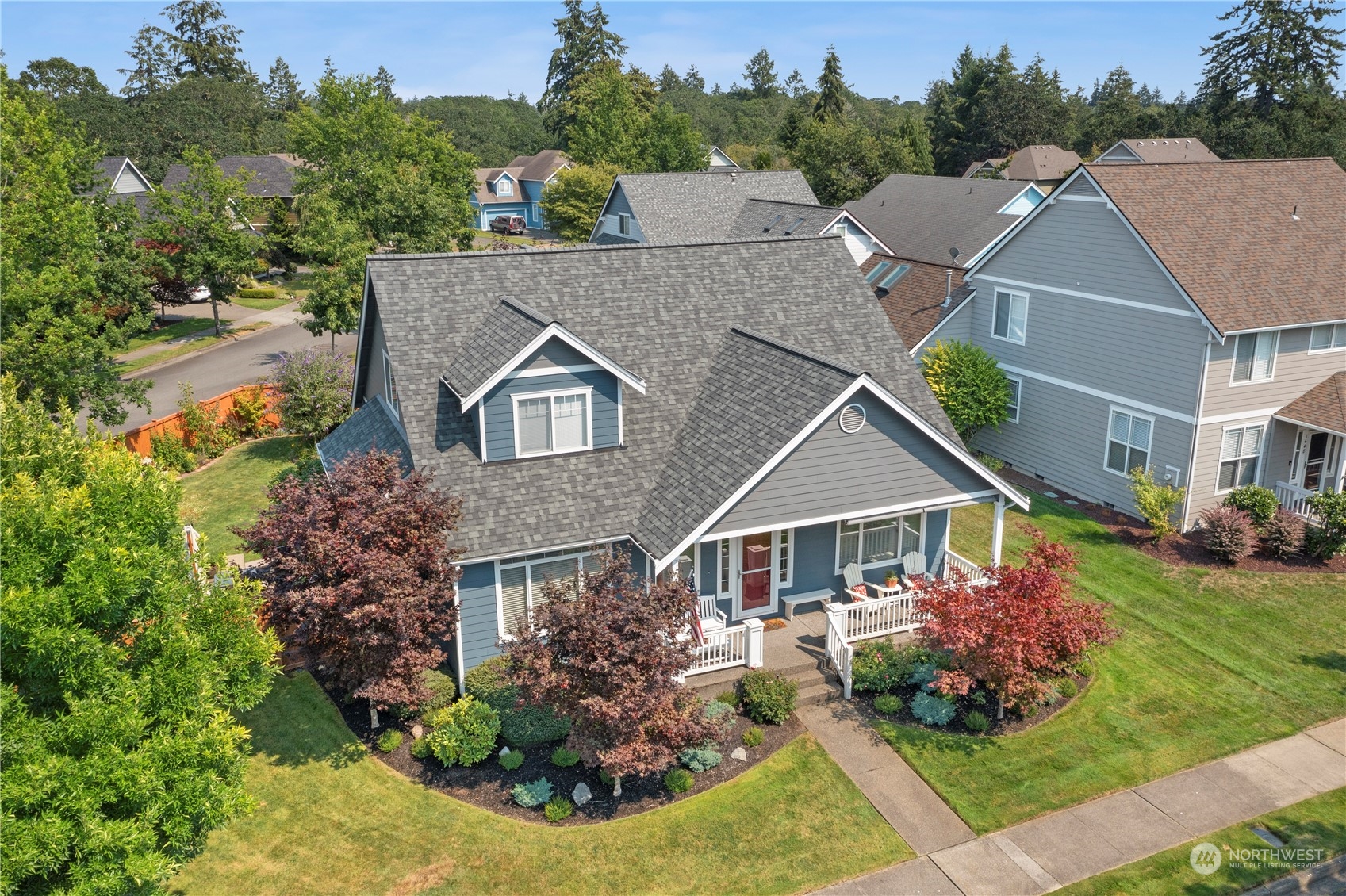 1460 Latham Court DuPont, WA 98327 - Photo 38 of 40 a aerial view of a house next to a yard
