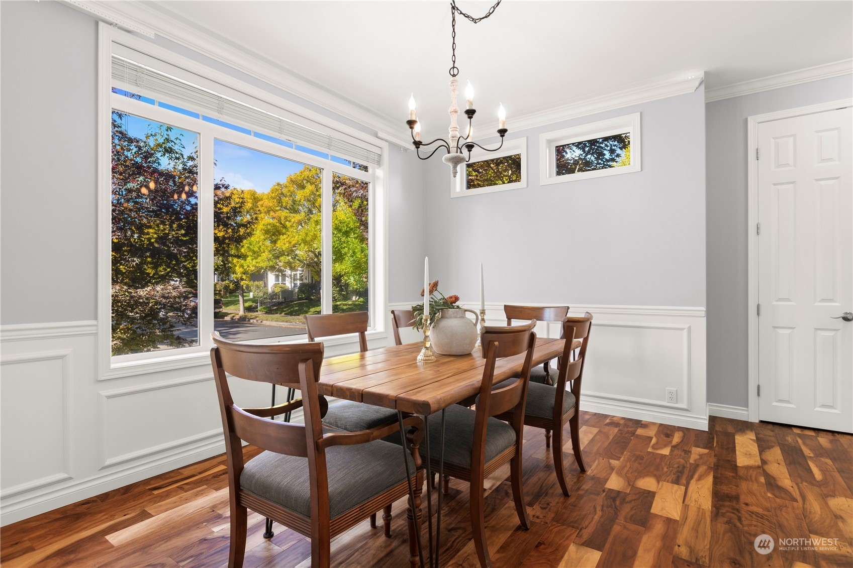 1460 Latham Court DuPont, WA 98327 - Photo 6 of 40 a view of a dining room with furniture window and wooden floor