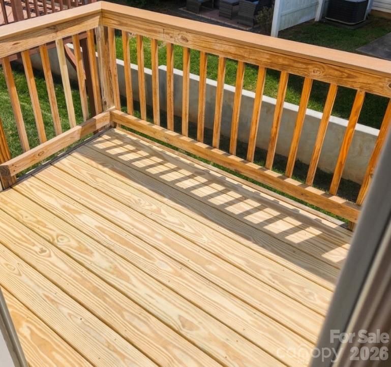 104 Rock Ridge Lane Mount Holly, NC 28120 - Photo 41 of 48 a view of wooden balcony