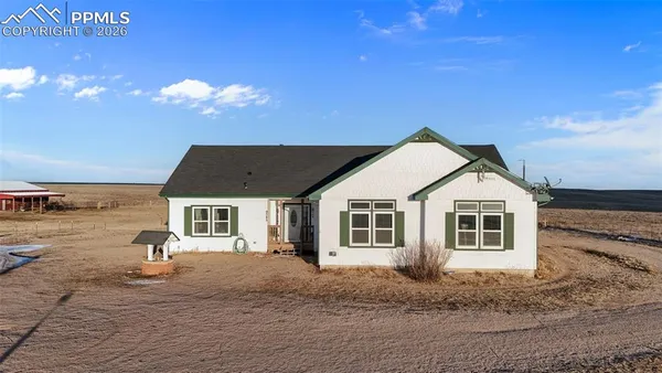 a very nice looking house with a large window