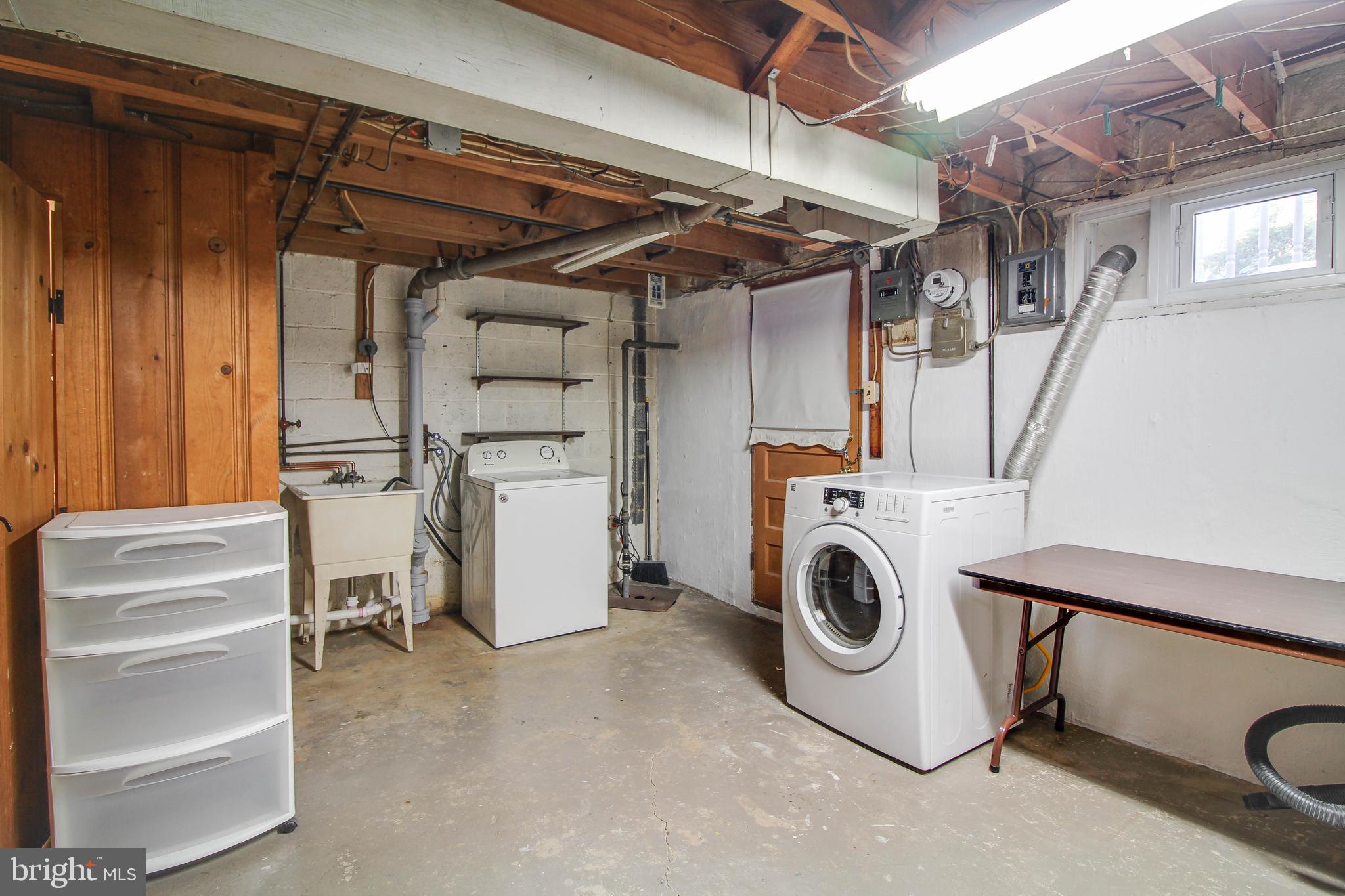 5638 Braxfield Road Halethorpe, MD 21227 - Photo 25 of 29 Newer washer & dryer. Plastic cabinets come w home