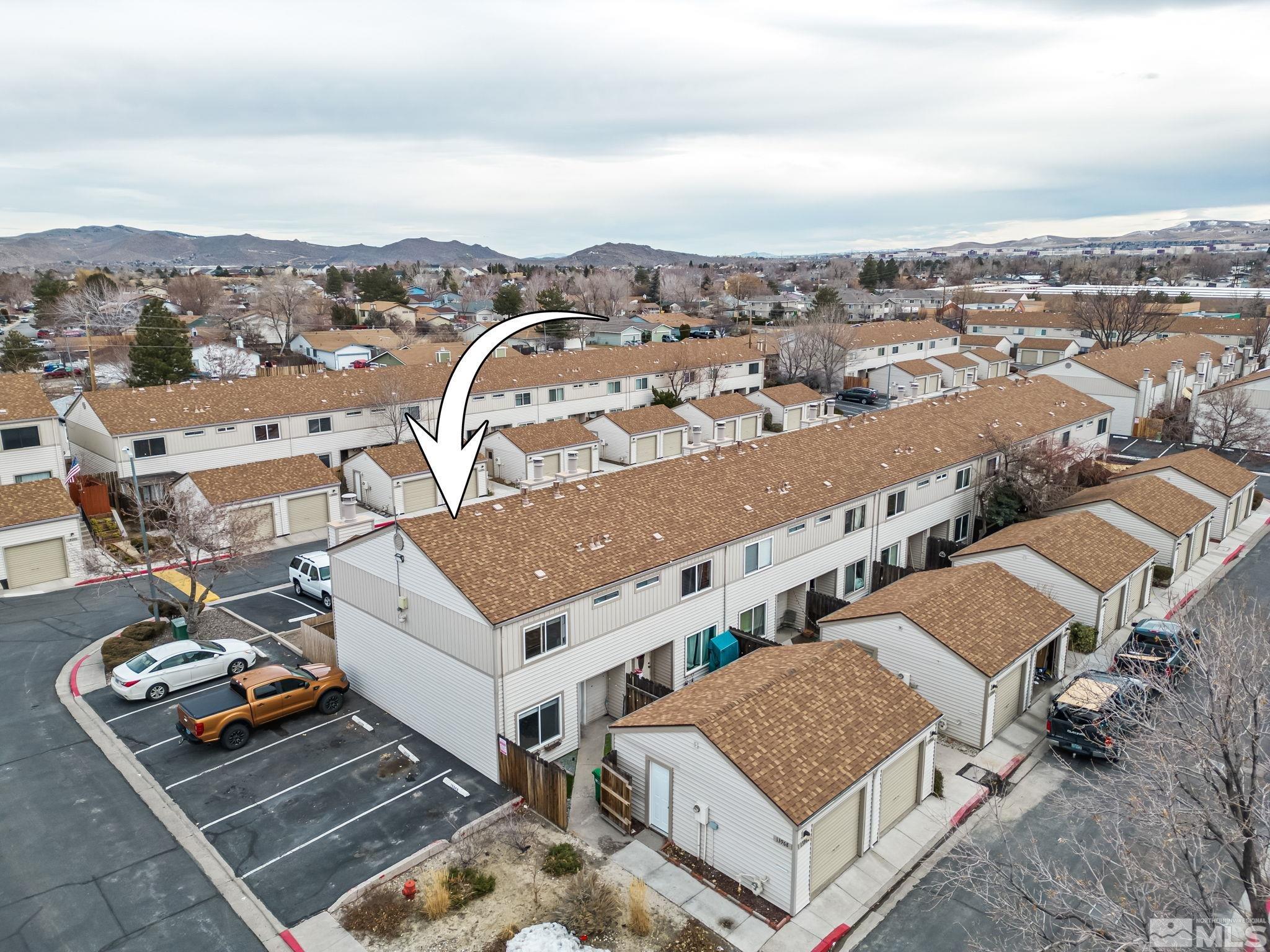 13968 Lear Boulevard Reno, NV 89506 - Photo 38 of 39 an aerial view of multiple houses with a city