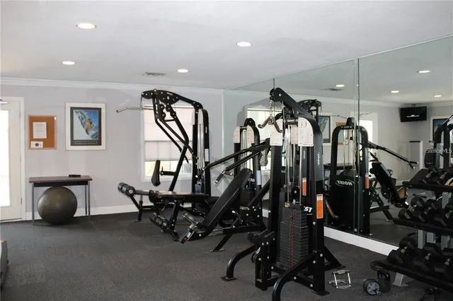 a view of a room with gym equipment