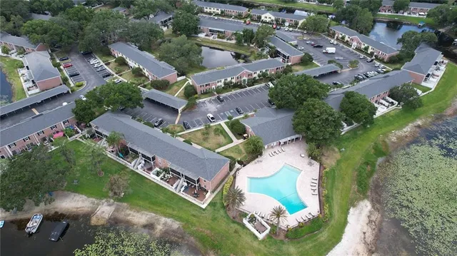 an aerial view of a house with a garden