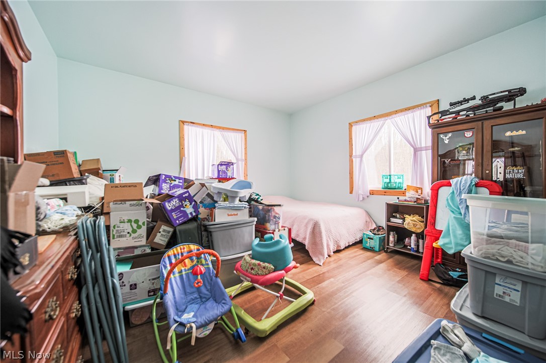 3542 Mann Road Andover, OH 44003 - Photo 13 of 42 Bedroom featuring wood finished floors